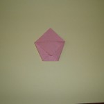 piegare il triangolo centrale dell'origami